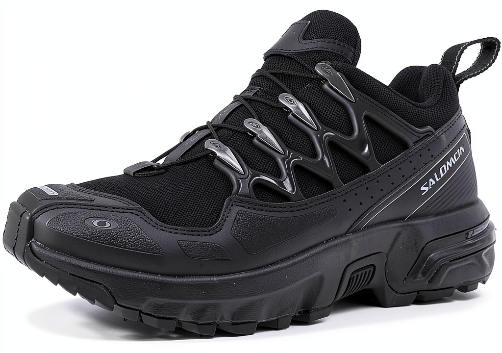 Installing Salomon Trail Running Shoes Black Silver Mens Womens on a wooden desk